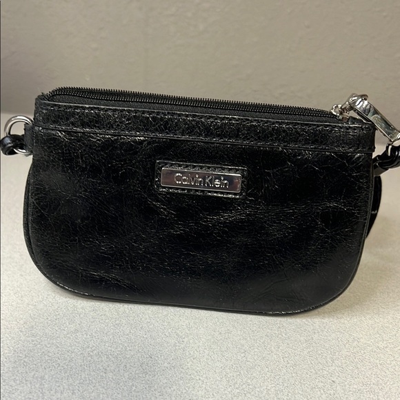 Calvin Klein Black Leather Clutch with Silver Accents - Picture 1 of 4
